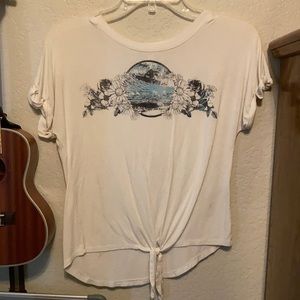 A girls cute white shirt sleeve shirt with graphic